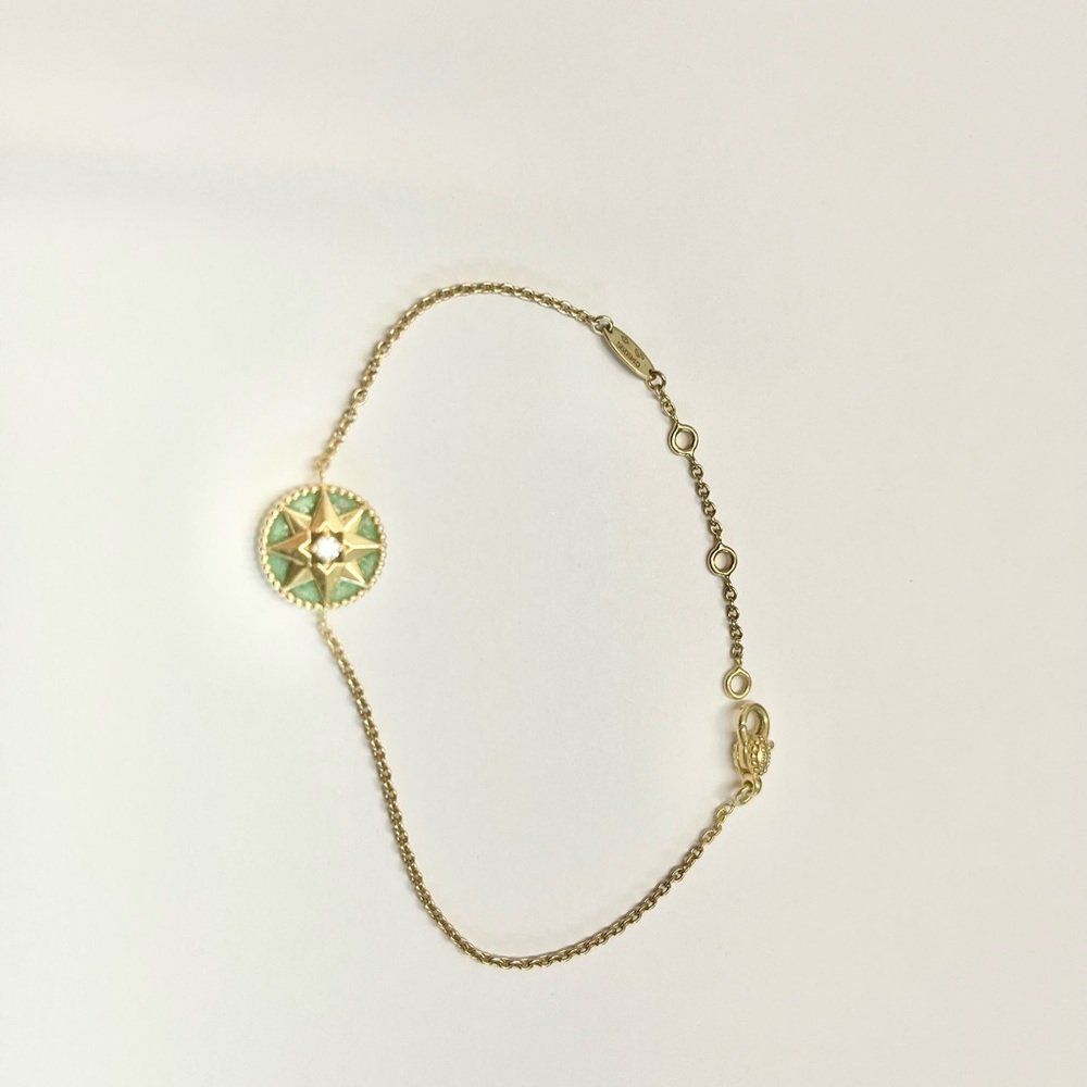Dior Rose des Vents 
18k Yellow Gold, Diamond (0.04 ct*) & Turquoise bracelet